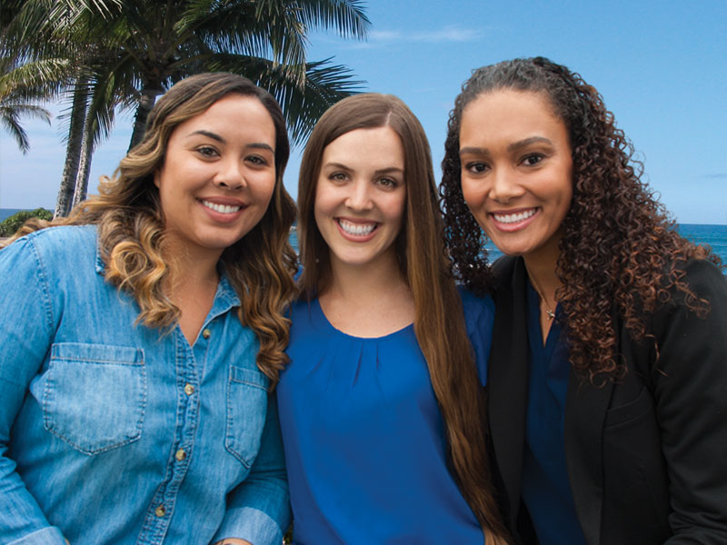 three smiling ladies